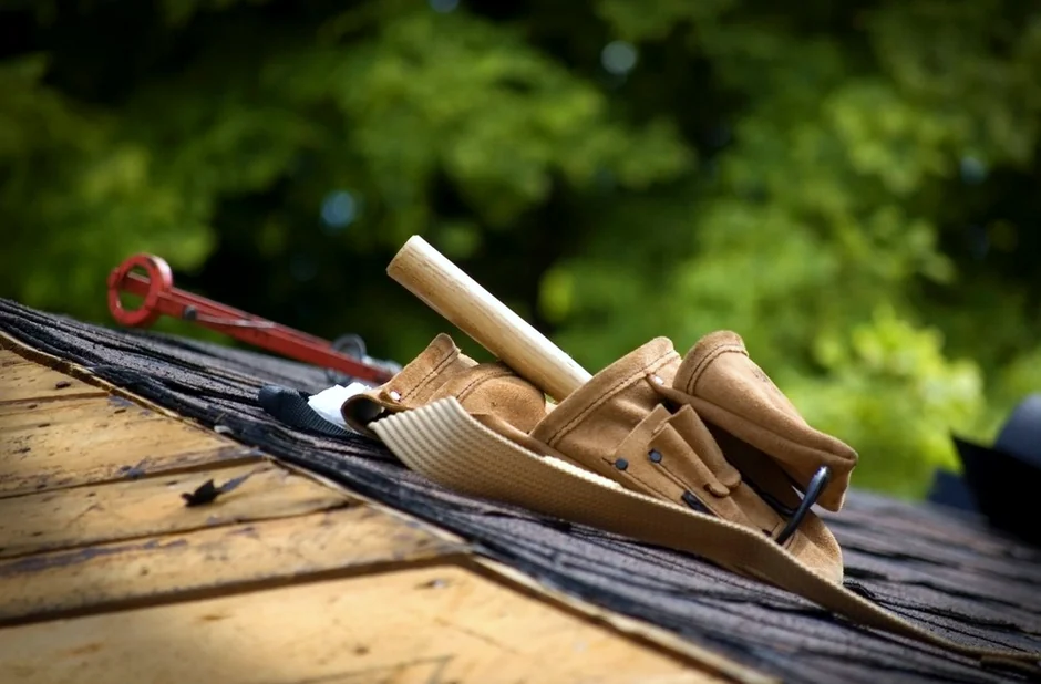 Roofing tools resting on a roof deck